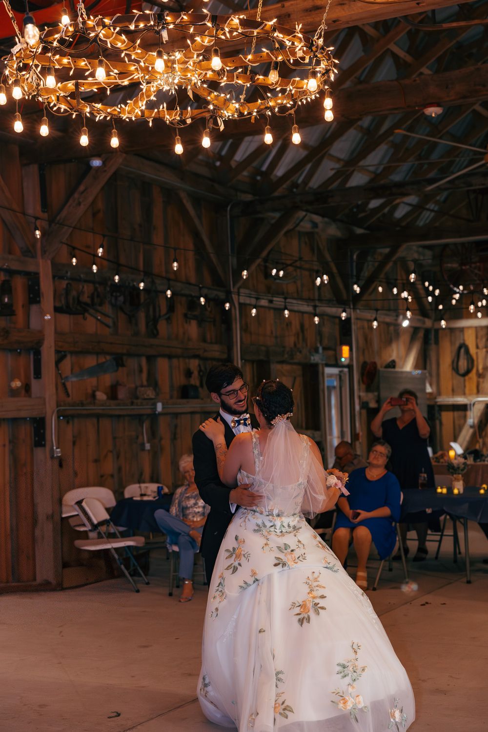 Groom admiring his new bride during their first dance at the wedding.