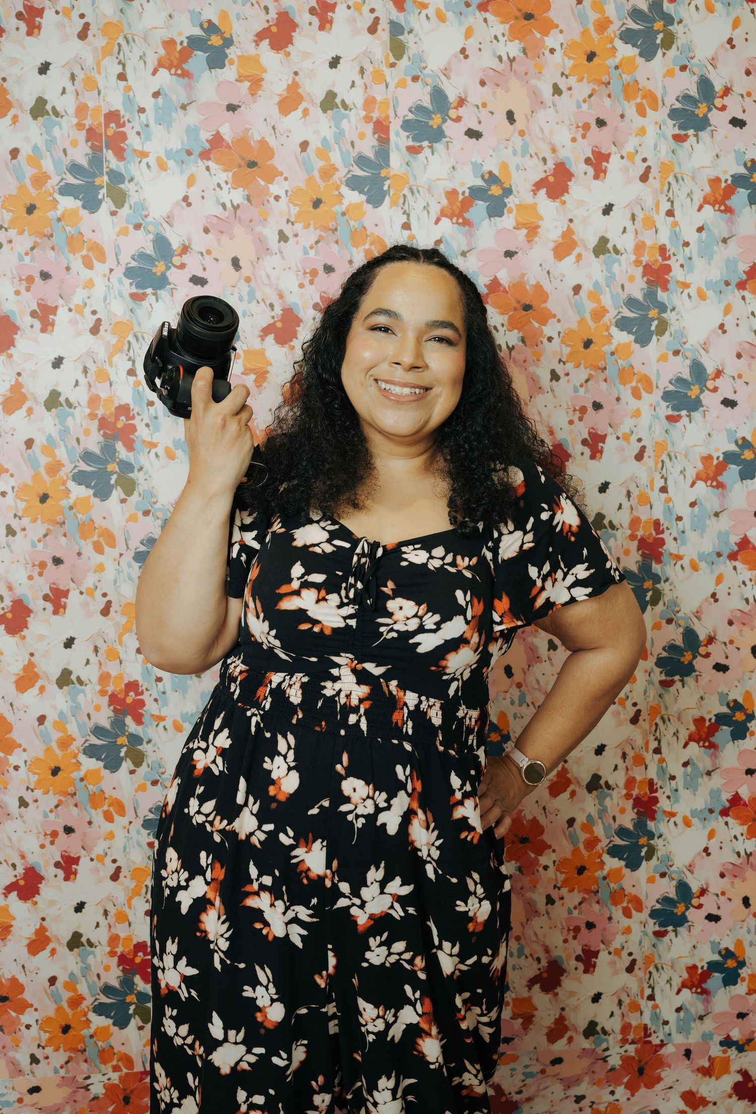Playful branding photo with floral backdrop by Seattle personal brand photographer