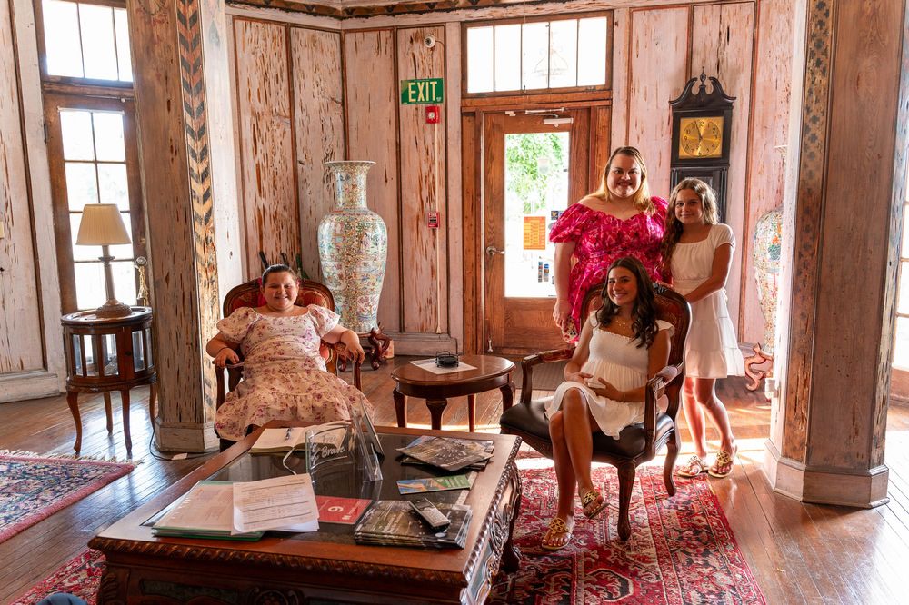 Montage of wedding celebration moments showing multiple interior scenes at a historic venue with pink and red decorative elements.