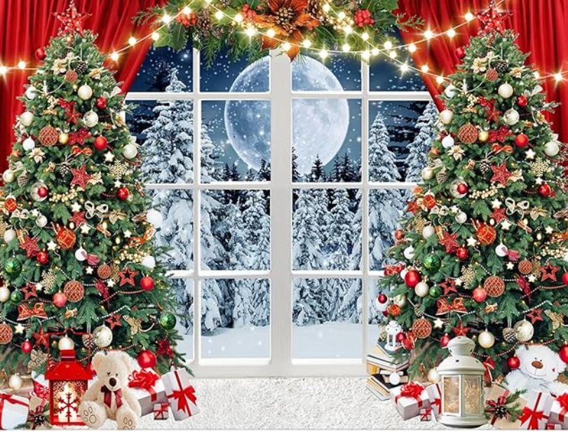 Christmas scene with decorated trees flanking a window showing a full moon over snowy landscape.