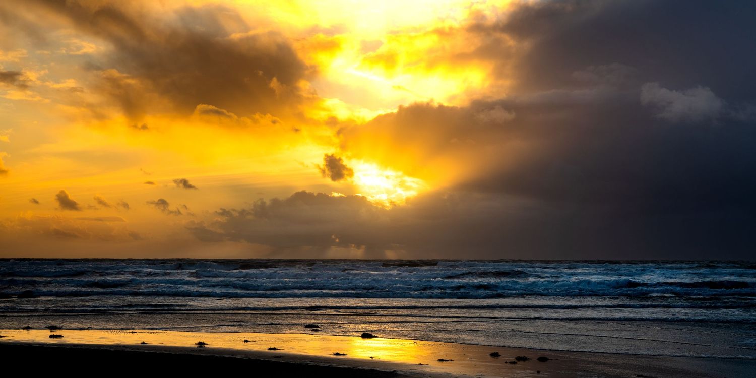 Sunset over Widemouth Bay, Bude, Cornwall, United Kingdom.
