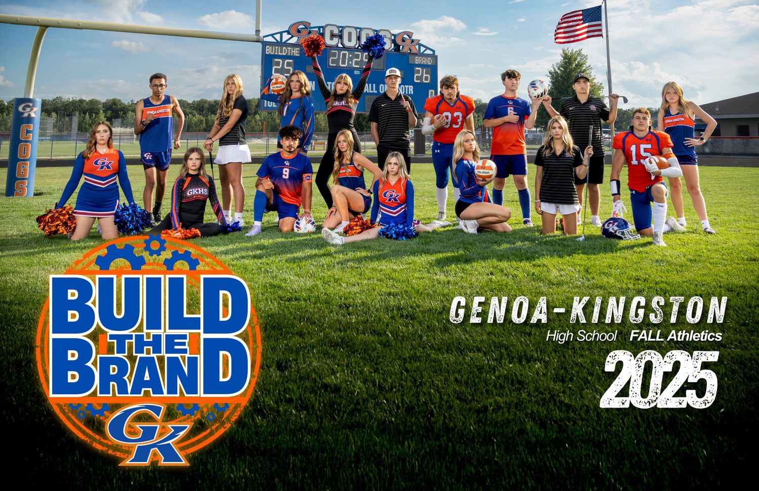 Students and athletes gather on a sunny field with American flag and school banners in the background.