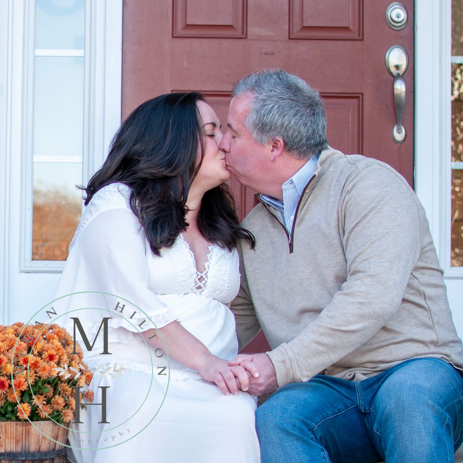 Fall photo couple kissing near door