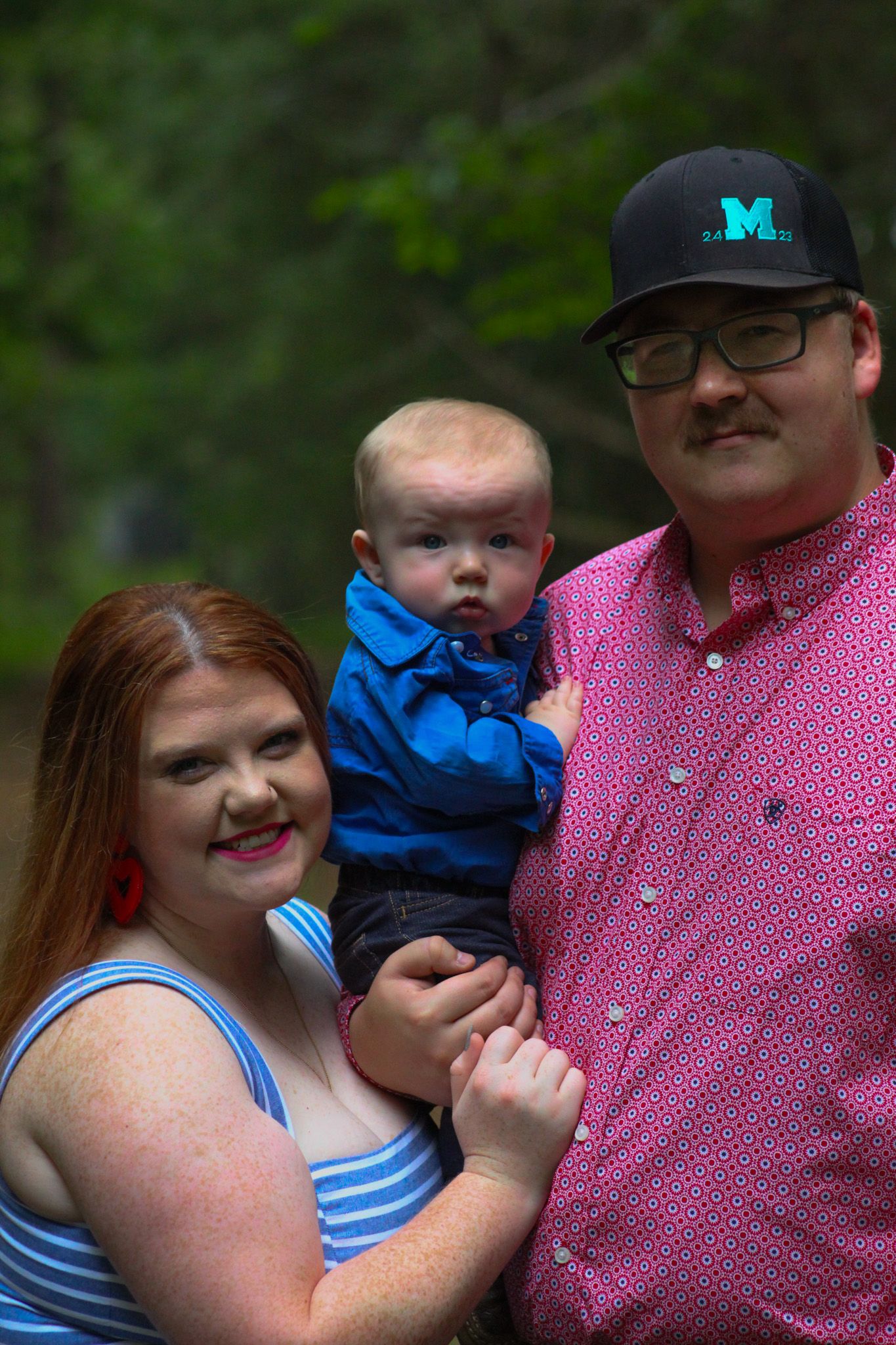 A candid family photoshoot series shows tender moments between parents and child in an outdoor setting.