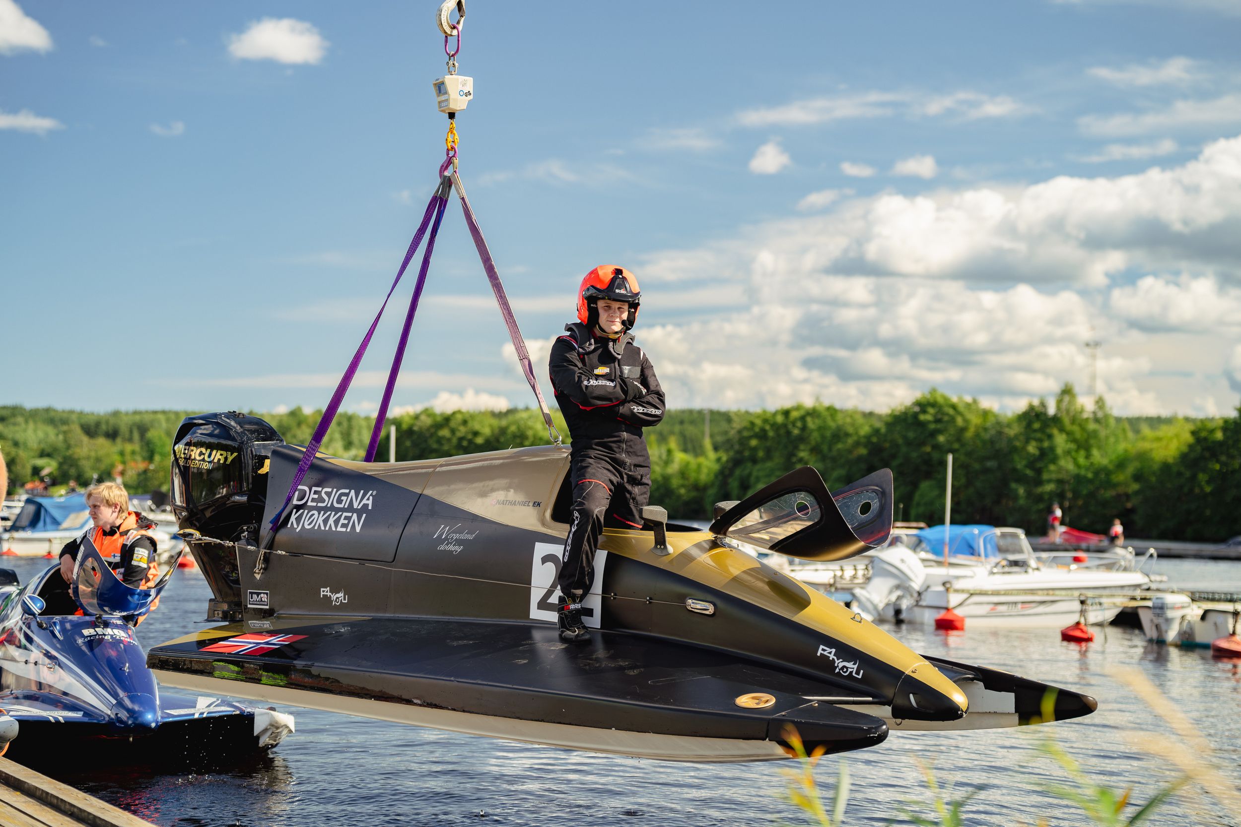 High-speed powerboat racing action shot from a water motorsport event. Perfect for sports coverage, event promotion, and adrenaline-fueled b