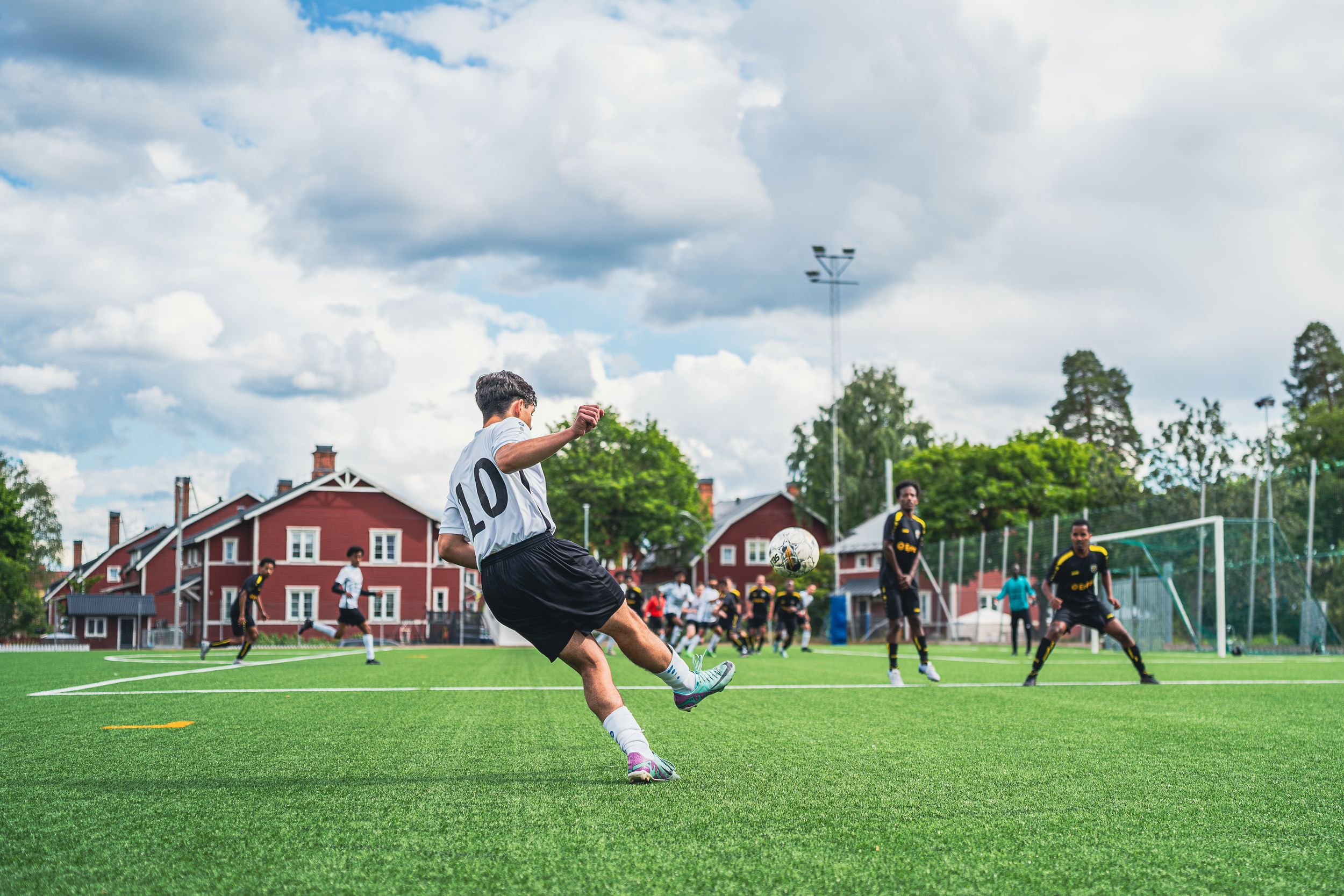 Dynamic sports photography capturing intense football action. Ideal for team branding, event promotions, and sports marketing.