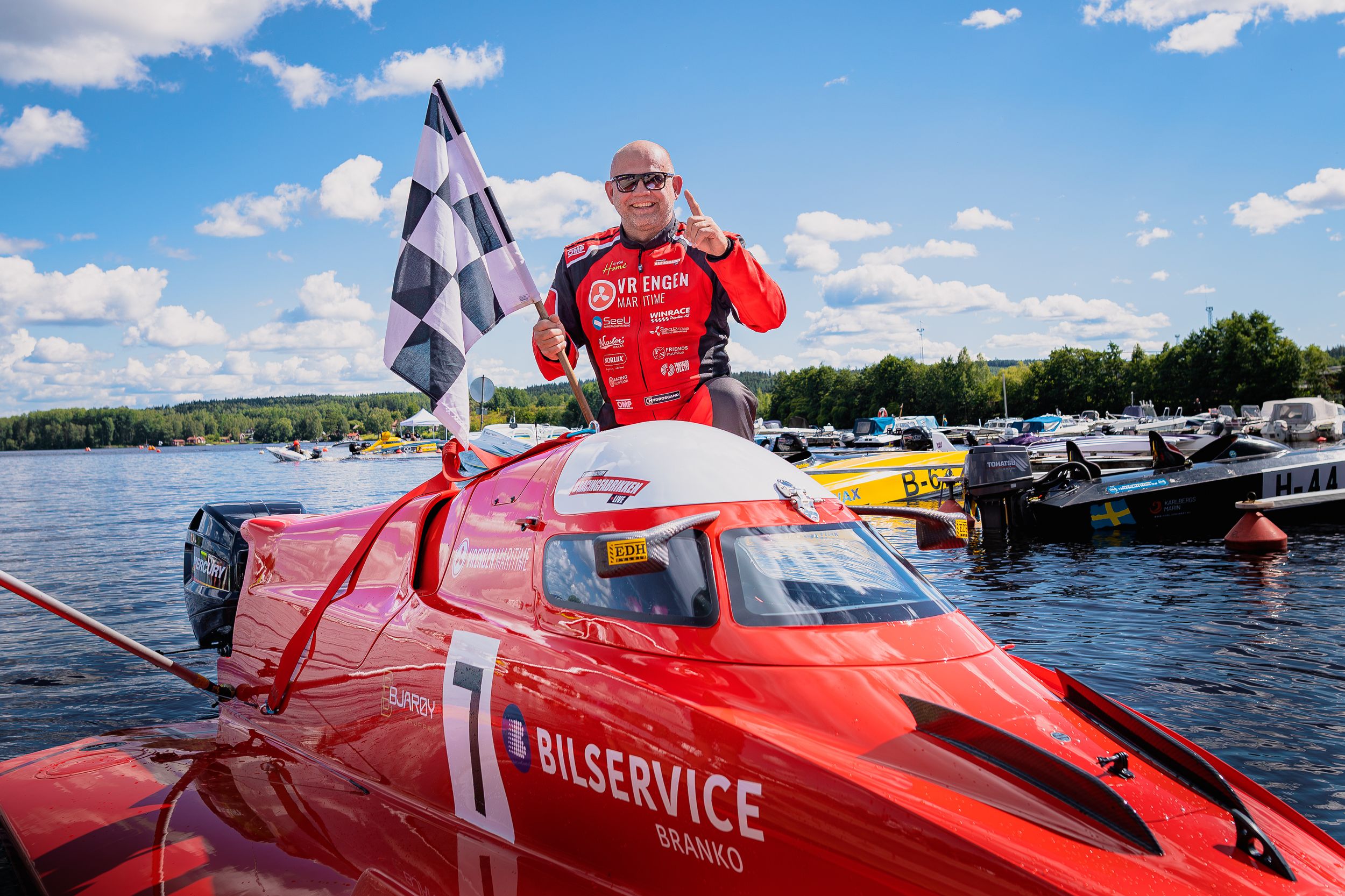 High-speed powerboat racing action shot from a water motorsport event. Perfect for sports coverage, event promotion, and adrenaline-fueled b