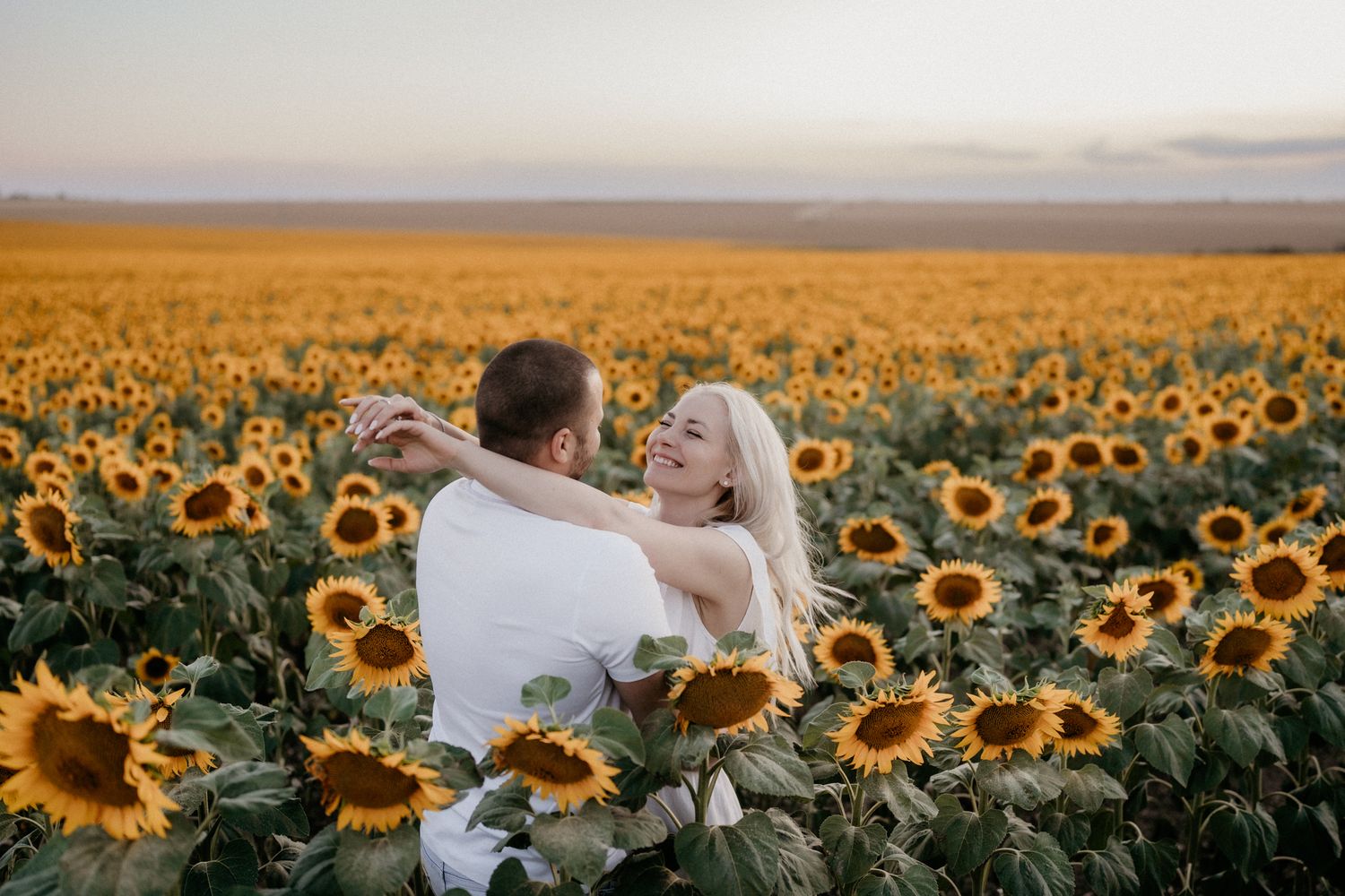 Intimate black and white portrait of a tender romantic moment.