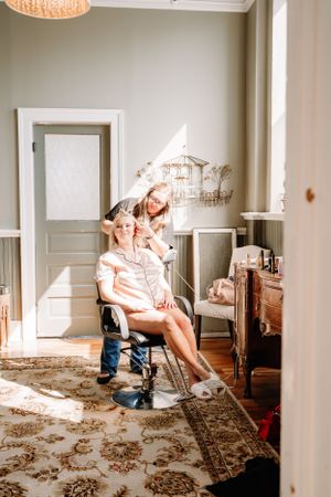 A rustic room with vintage decor and a warm sunlit atmosphere.