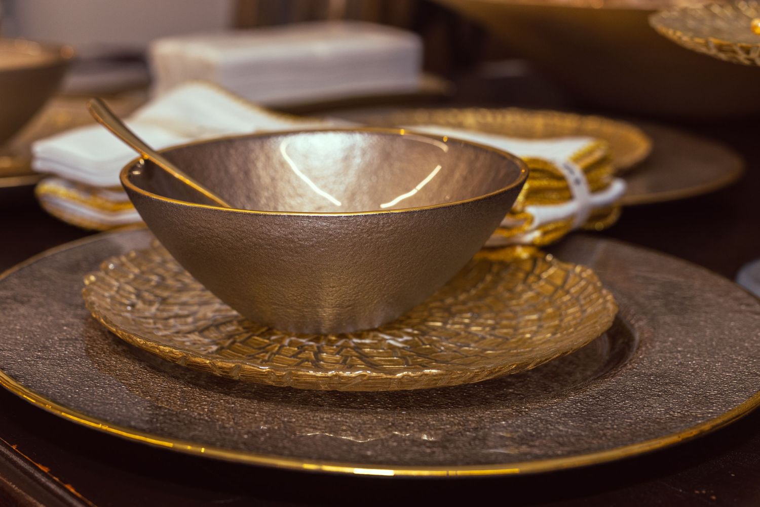 Product image of golden dishes staged for marketing, taken by Tasha Cannaday a local Windsor Ontario Photographer.