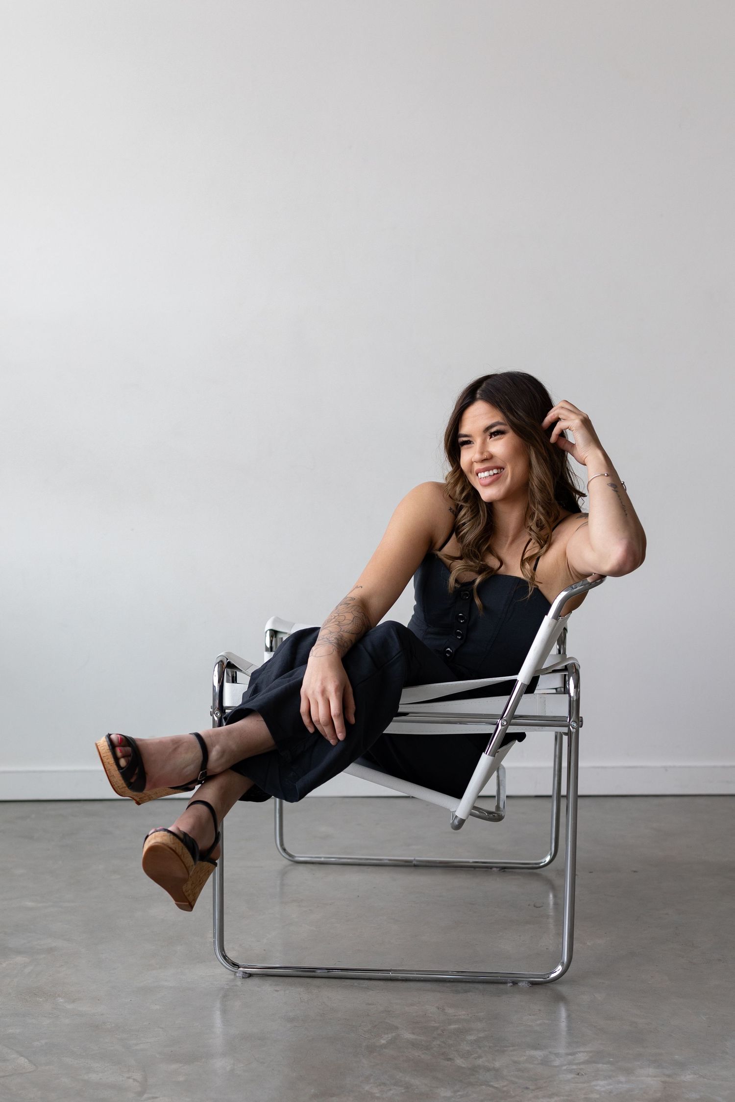 photographer poses for a photoshoot in calgary alberta