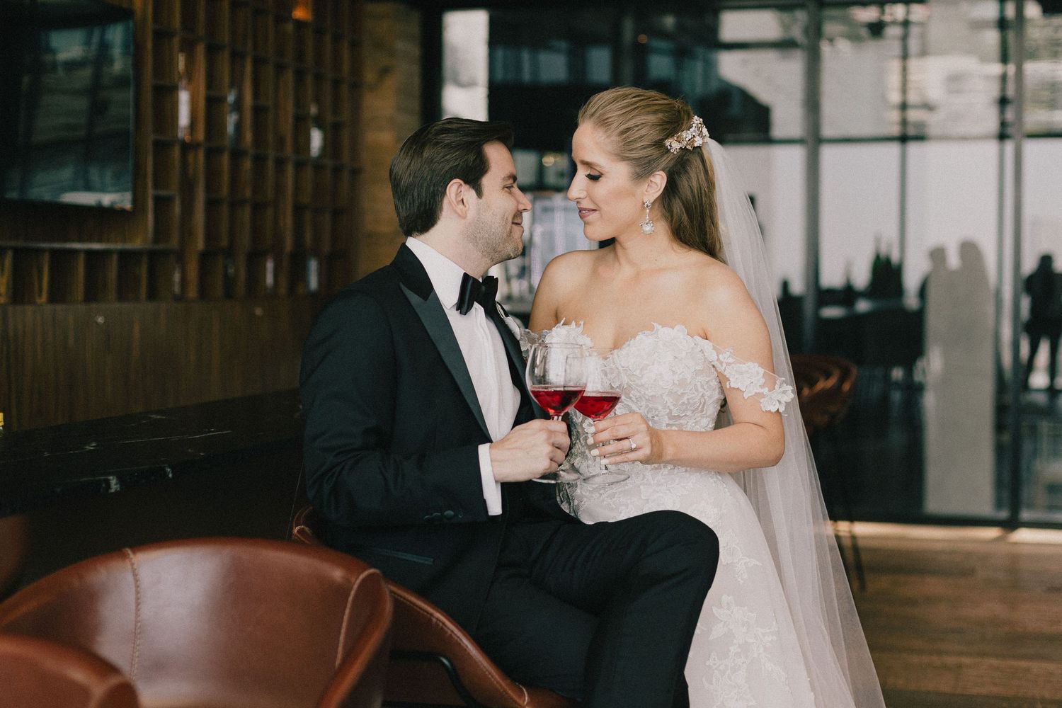 Indoor wedding reception venue with elegant decor and intimate moments.