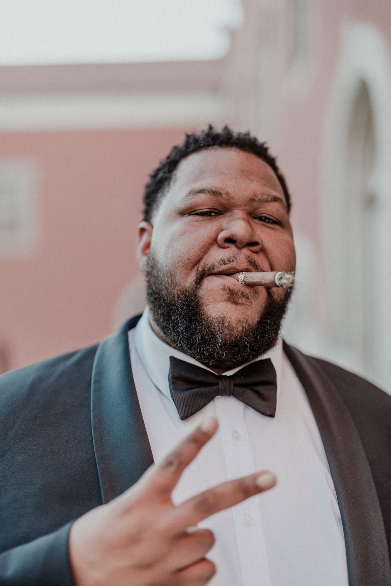 Wedding guest posing casually during a relaxed documentary wedding in Porto, Portugal