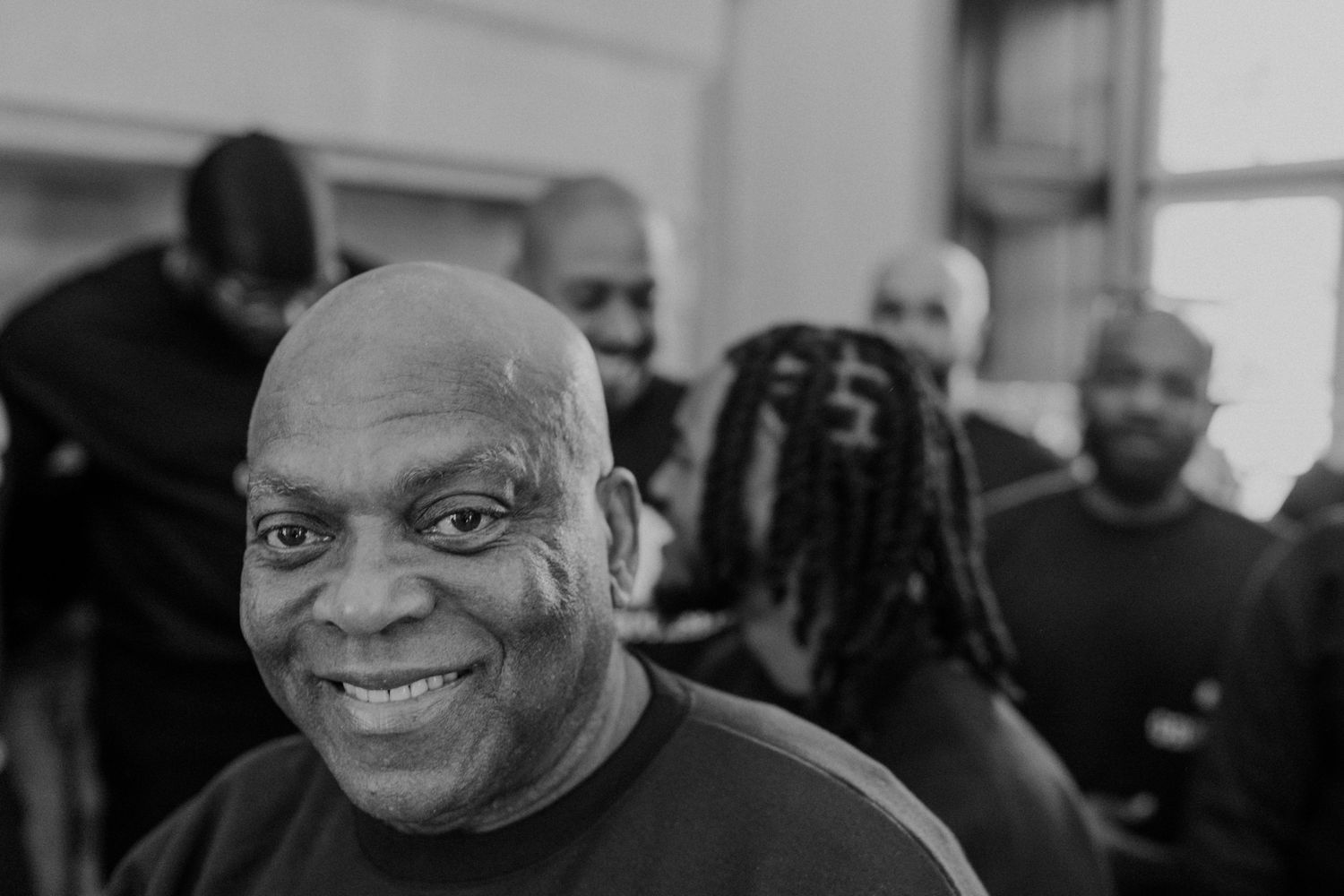 Wedding guest smiling during a relaxed, documentary wedding in Porto, Portugal