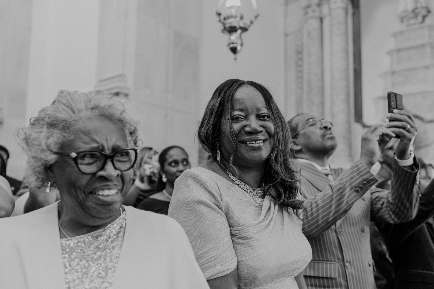 Emotional moment between wedding guests during an intimate wedding in Portugal