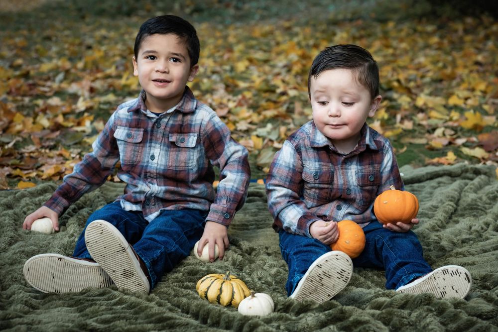 Family fall portraits take at Finch Arboretum in Spokane Washington.