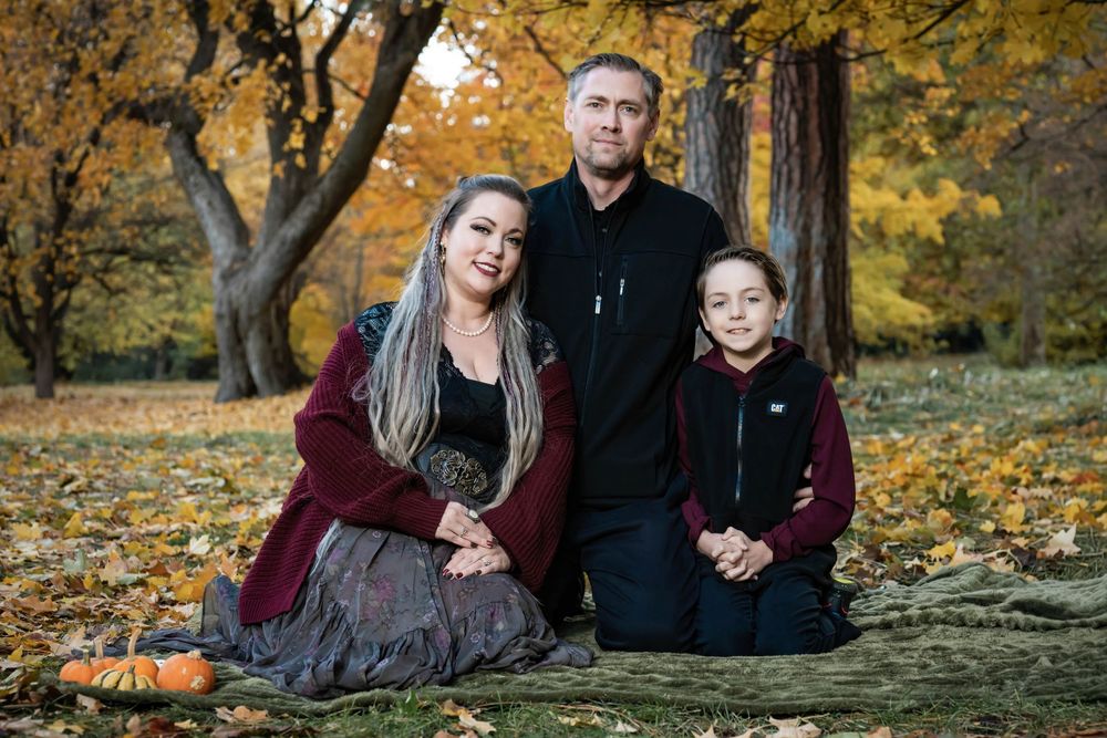 Family fall portraits take at Finch Arboretum in Spokane Washington.