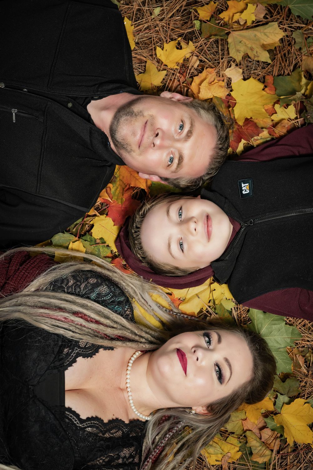 Family fall portraits take at Finch Arboretum in Spokane Washington.