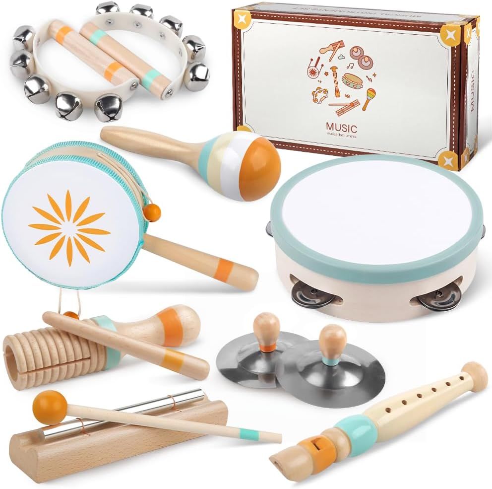 Collection of wooden musical percussion instruments including tambourines, xylophones, and rhythm sticks arranged in a row.