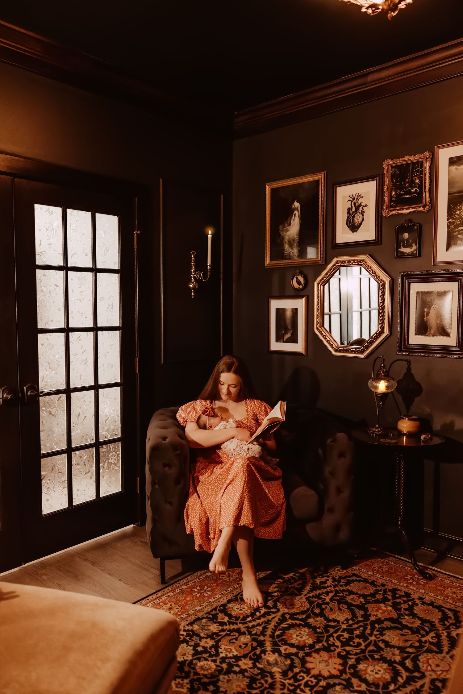 Moody boudoir photo series in vintage room with dark walls and patterned carpet showing dramatic window lighting.