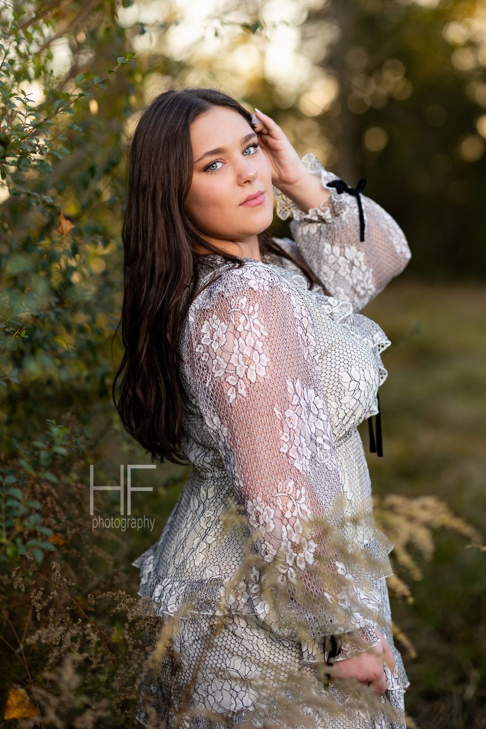 Artistic portrait series featuring detailed white lace dress against sunset-lit trees.