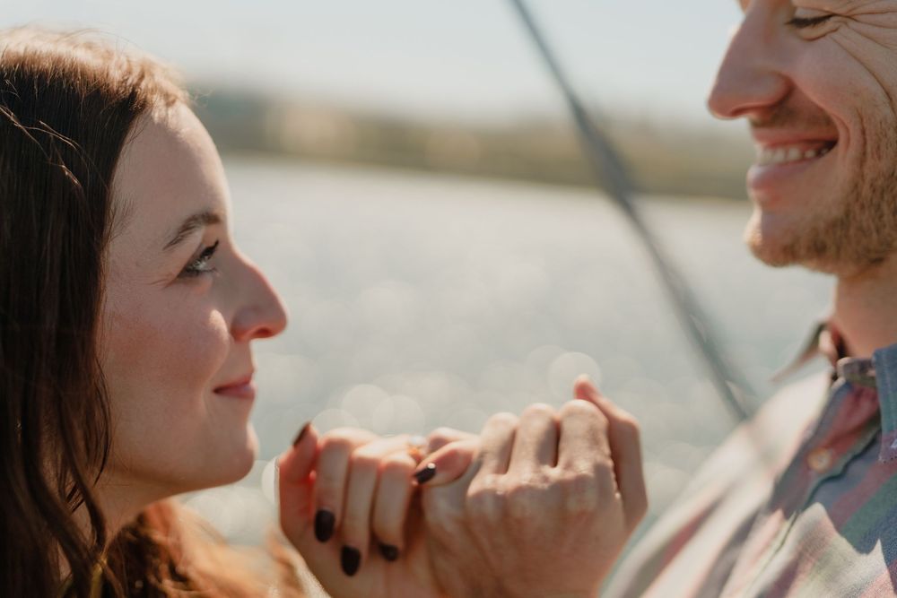 A series of romantic engagement photos showing a couple sharing intimate moments in warm sunlight.