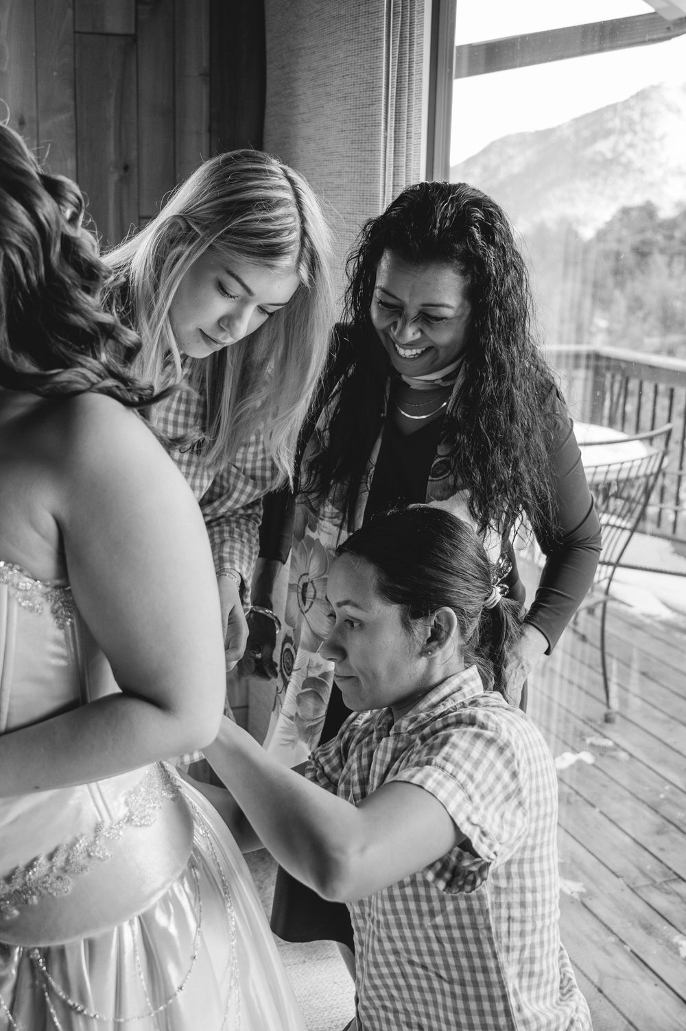 Black and white photos show intimate moments during wedding preparations on a rustic porch.