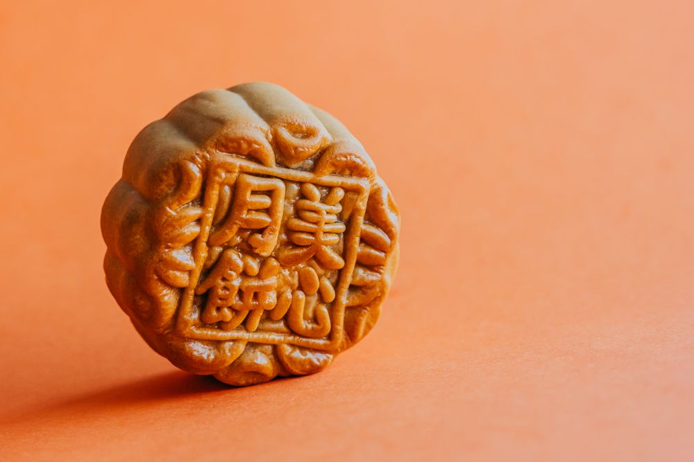 Close up of a moon cake celebrating lunar new year. International Photography Awards 2025