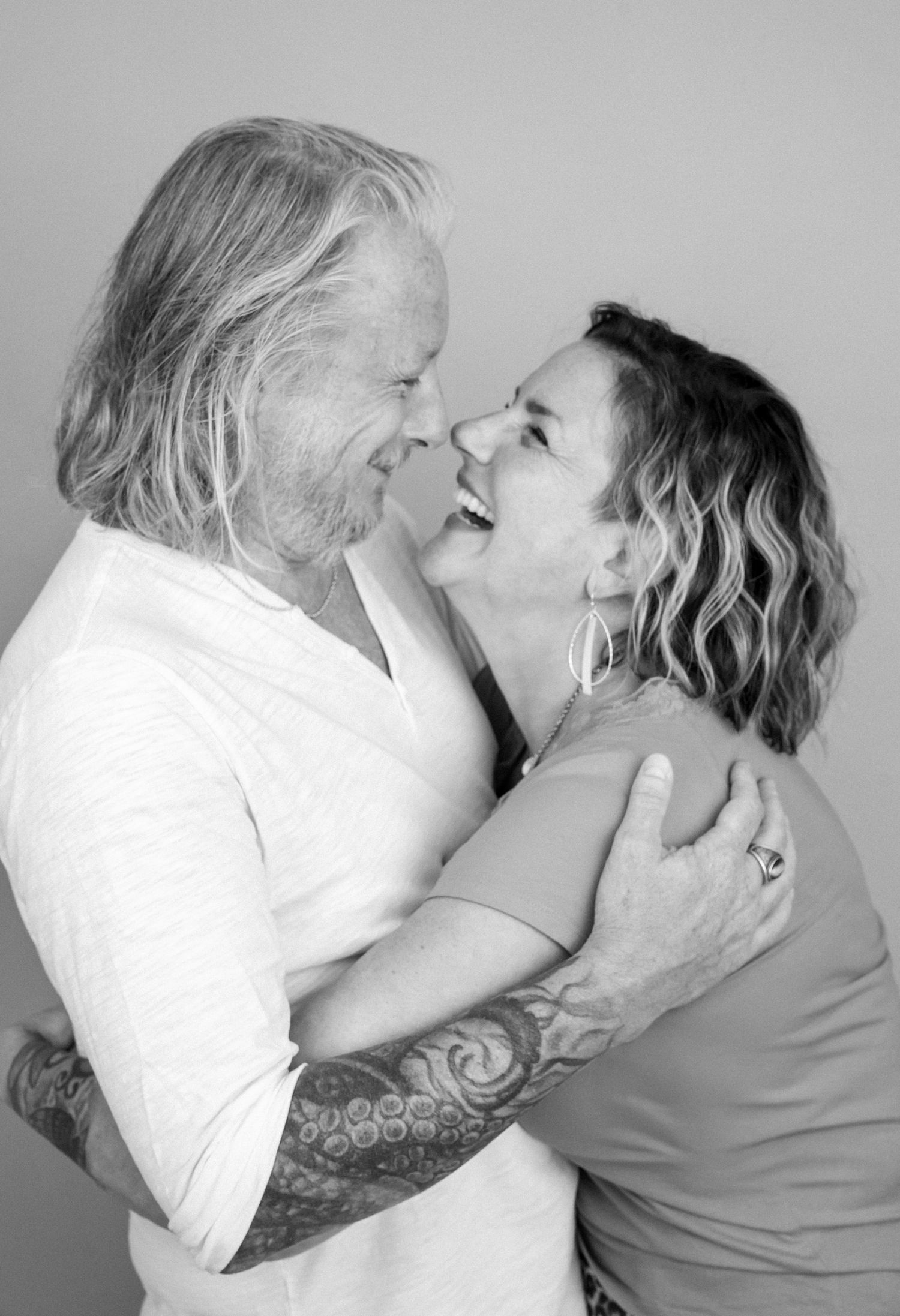 Black and white portraits showing intimate emotional moments between two people.
