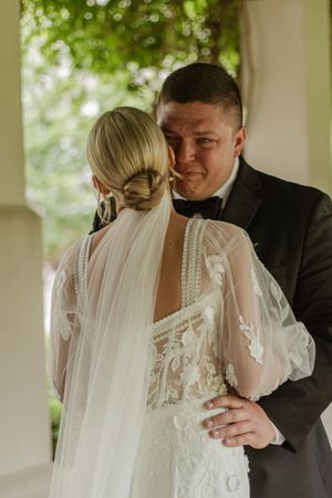 Series of intimate first look wedding moments captured in soft natural light under a covered porch.