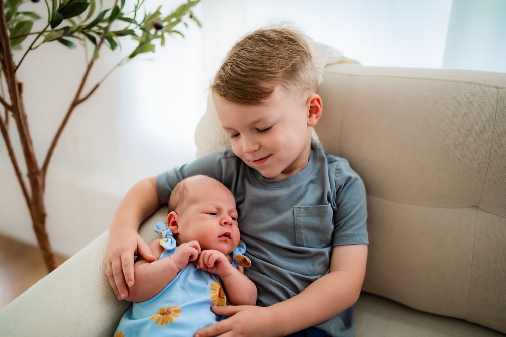 A series of tender moments showing siblings bonding together in cozy home settings.