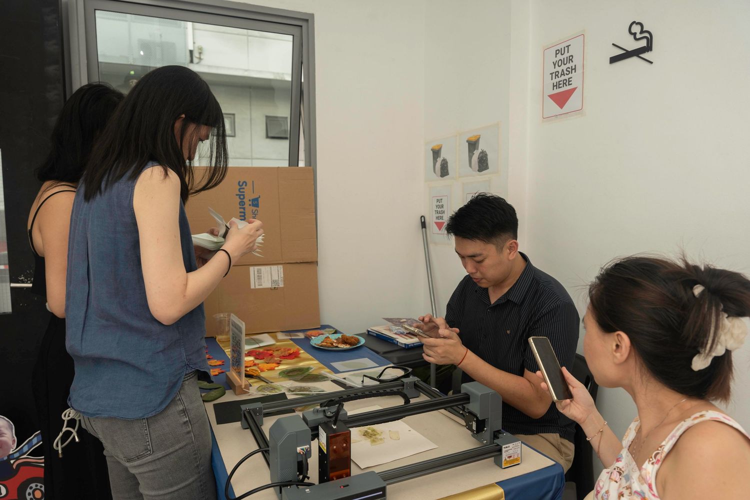 Students work diligently at desks in a classroom setting during an academic session.
