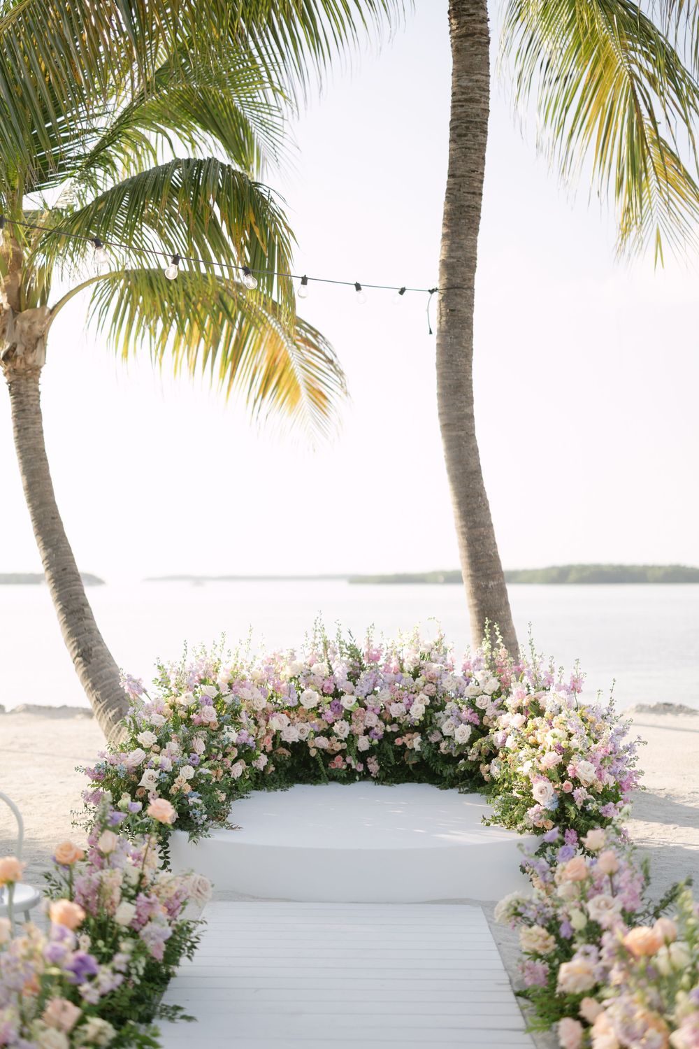 Florida, Key West, Islamorada wedding on the beach with elegant, whimsical, colorful florals. Cocktail hour also on the beach