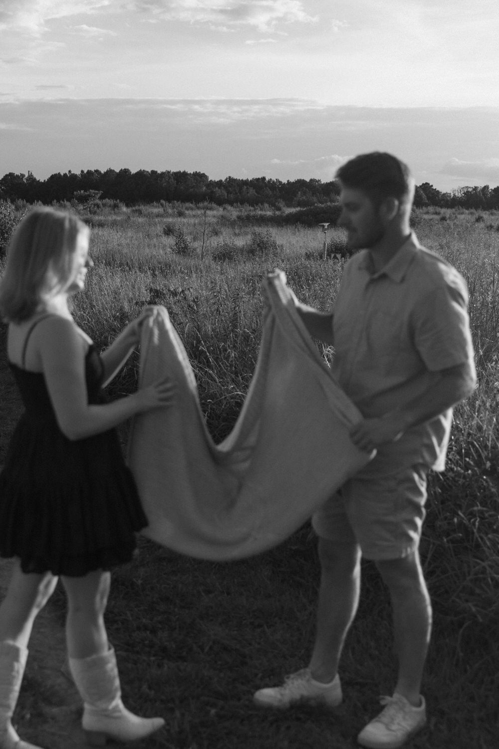 Birthday couples session in Blue Ridge, Georgia with playful moments.