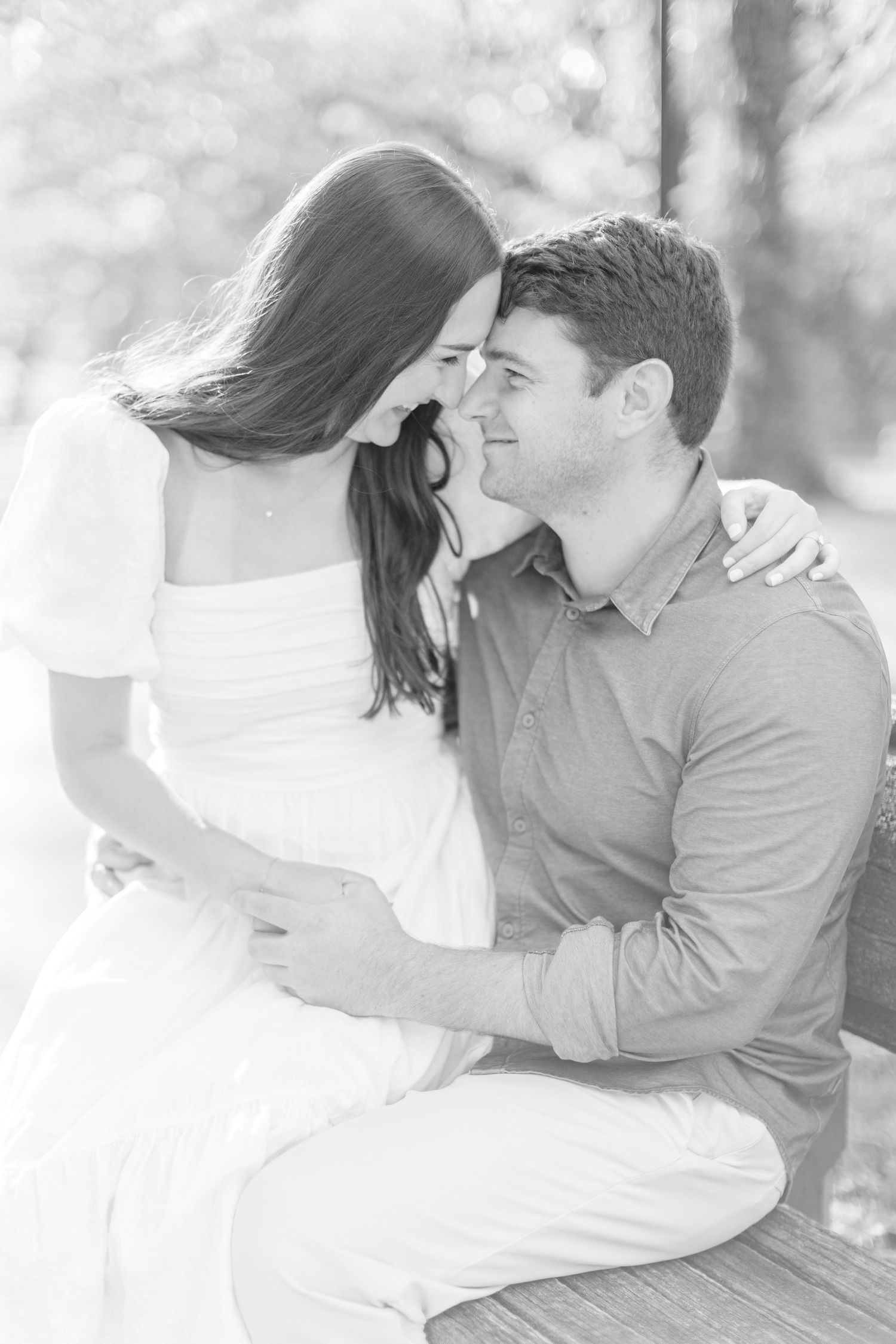 Two people share a romantic kiss outdoors in winter, creating a dreamy monochrome collage of intimate moments.