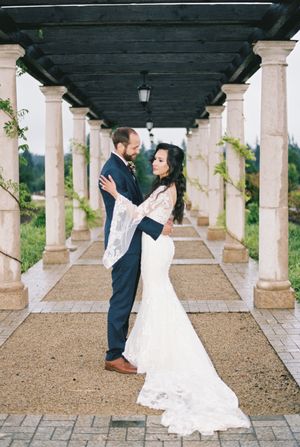 A romantic sequence of wedding photos showing a couple dancing under an elegant columned walkway.