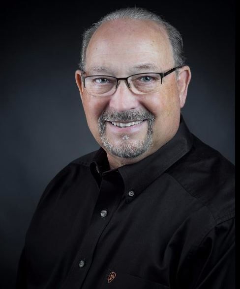 Picture of a man who left a 5 star review for headshots taken by professional photographer in East Tennessee