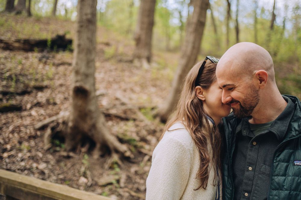 Casually dressed couple embracing in the woods on their elopement day  | Shannon Konek, Pittsburgh Photographer