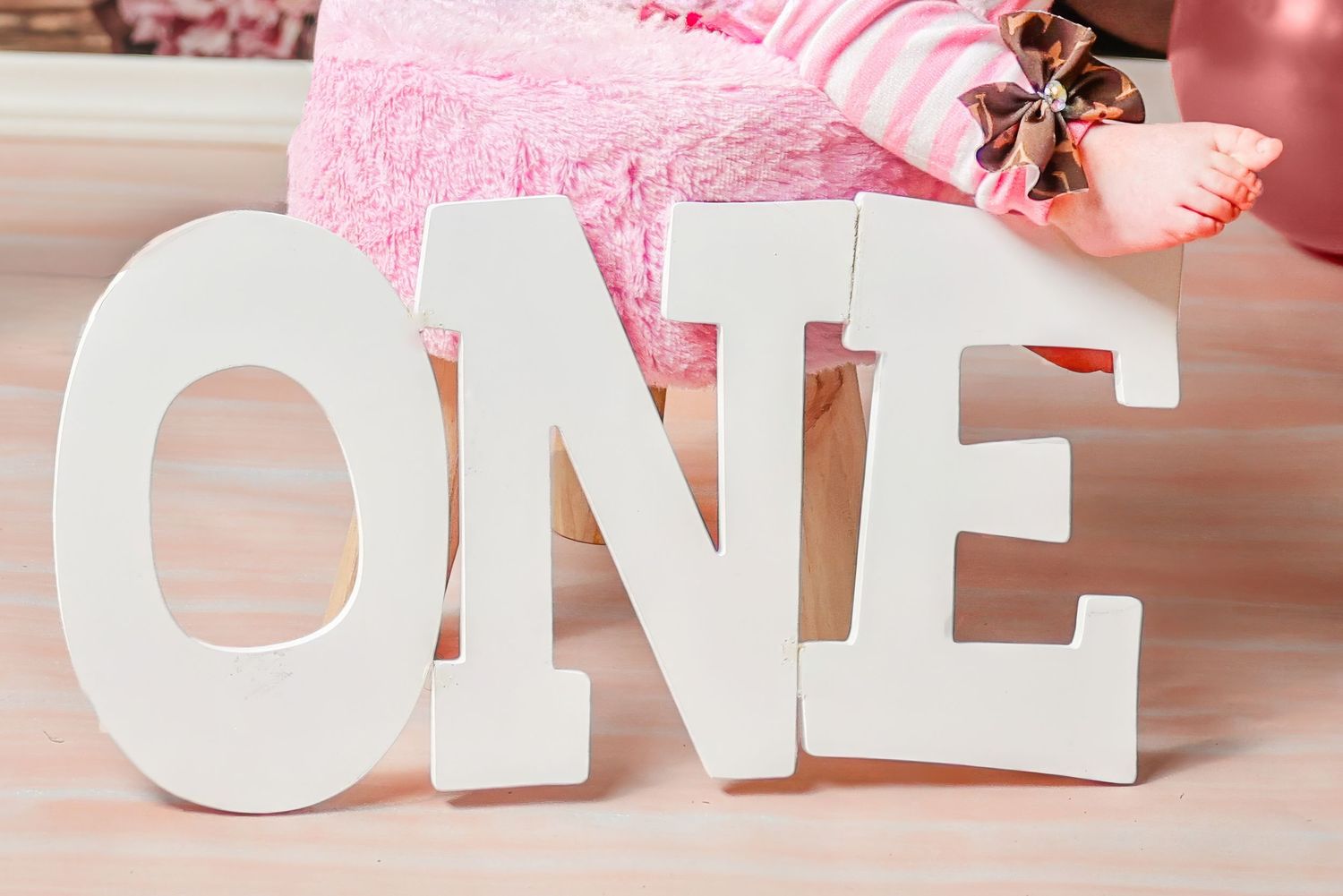 Large white decorative letters spelling out 'ONE' with pink decor  Carlsbad Roswell Artesia Hobbs New Mexico NM cake smash first birthday