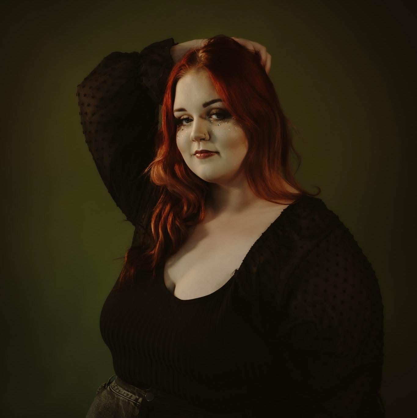 Dramatic portraits with dark aesthetic featuring someone in black attire against moody backdrop.