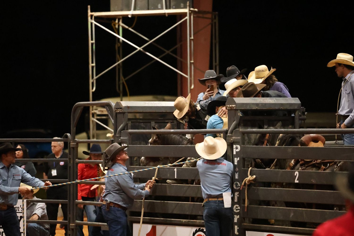 Behind the chutes getting ready for his retirement ride. Bronc Rider
