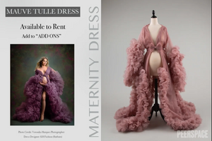 Mauve tulle maternity dress with romantic ruffles and plunging neckline displayed in studio.