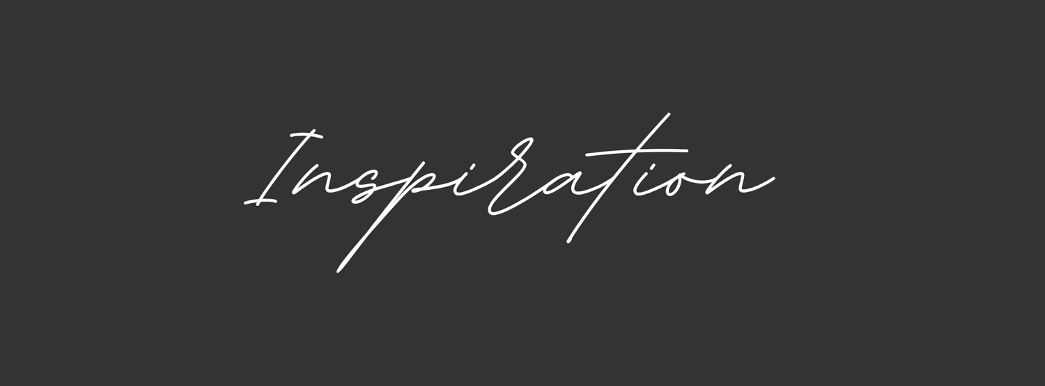 Elegant script text reading 'Inspiration' on dark gray background.