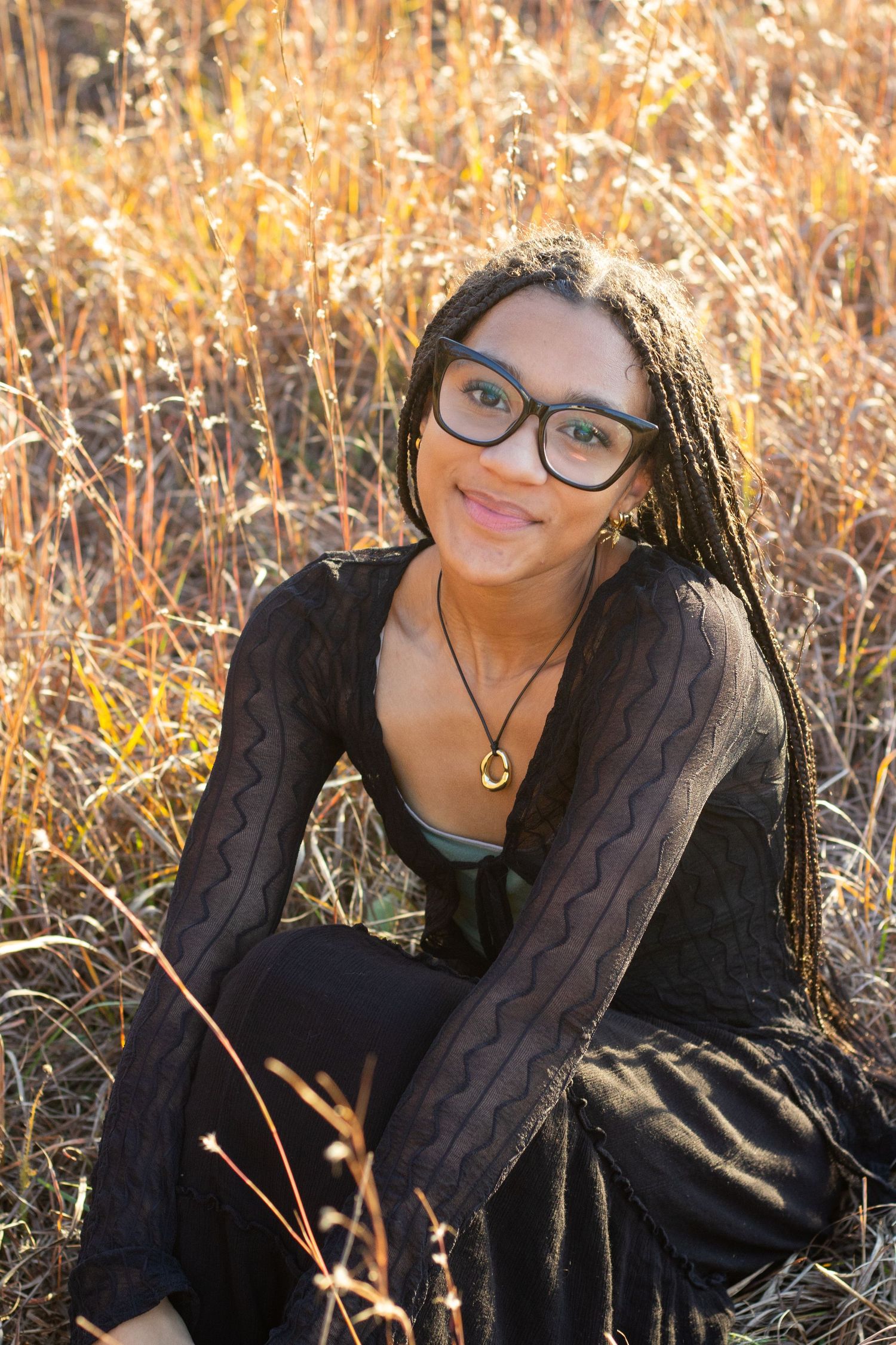 A series of portraits in a field of golden autumn grass during sunset with warm natural lighting.