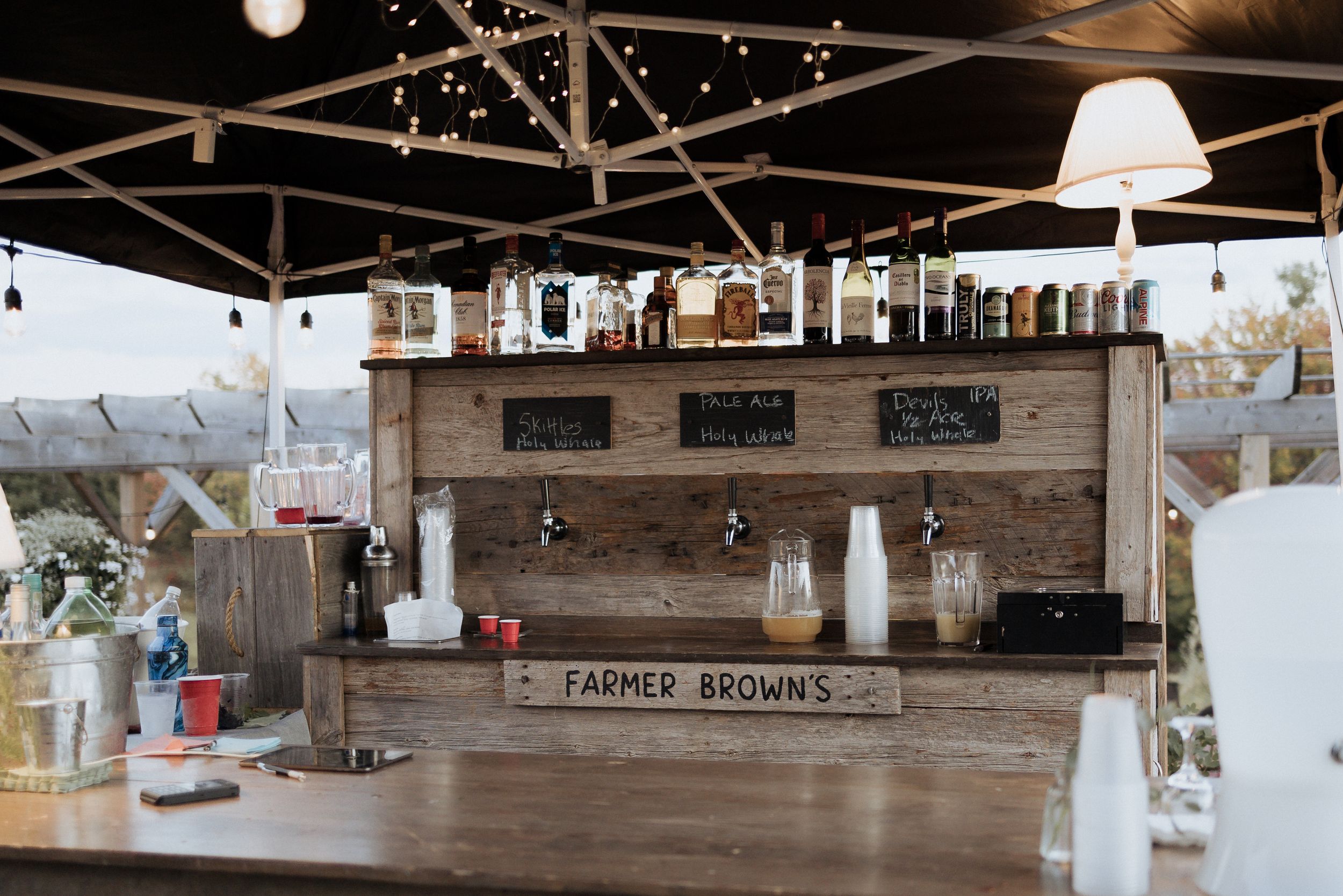 Farmer Brown's wedding, outdoor fall wedding Moncton photographer New Brunswick wedding, greenhouse wedding venue, outdoor bar craft beer