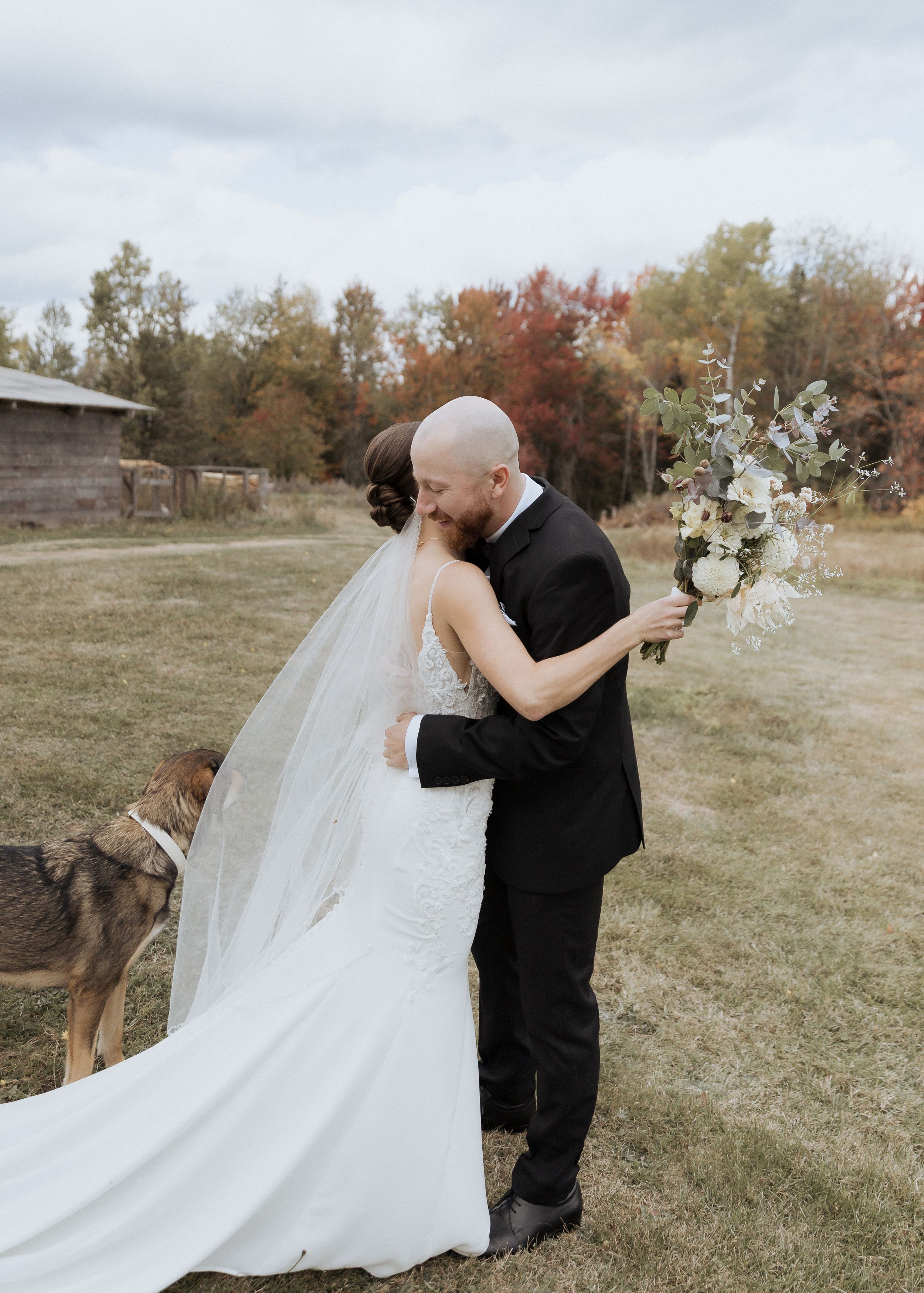 Bride and groom hug after first look at Farmer Brown's Greenhouse, Moncton photographer, top rated photographer, best photographer Maritimes