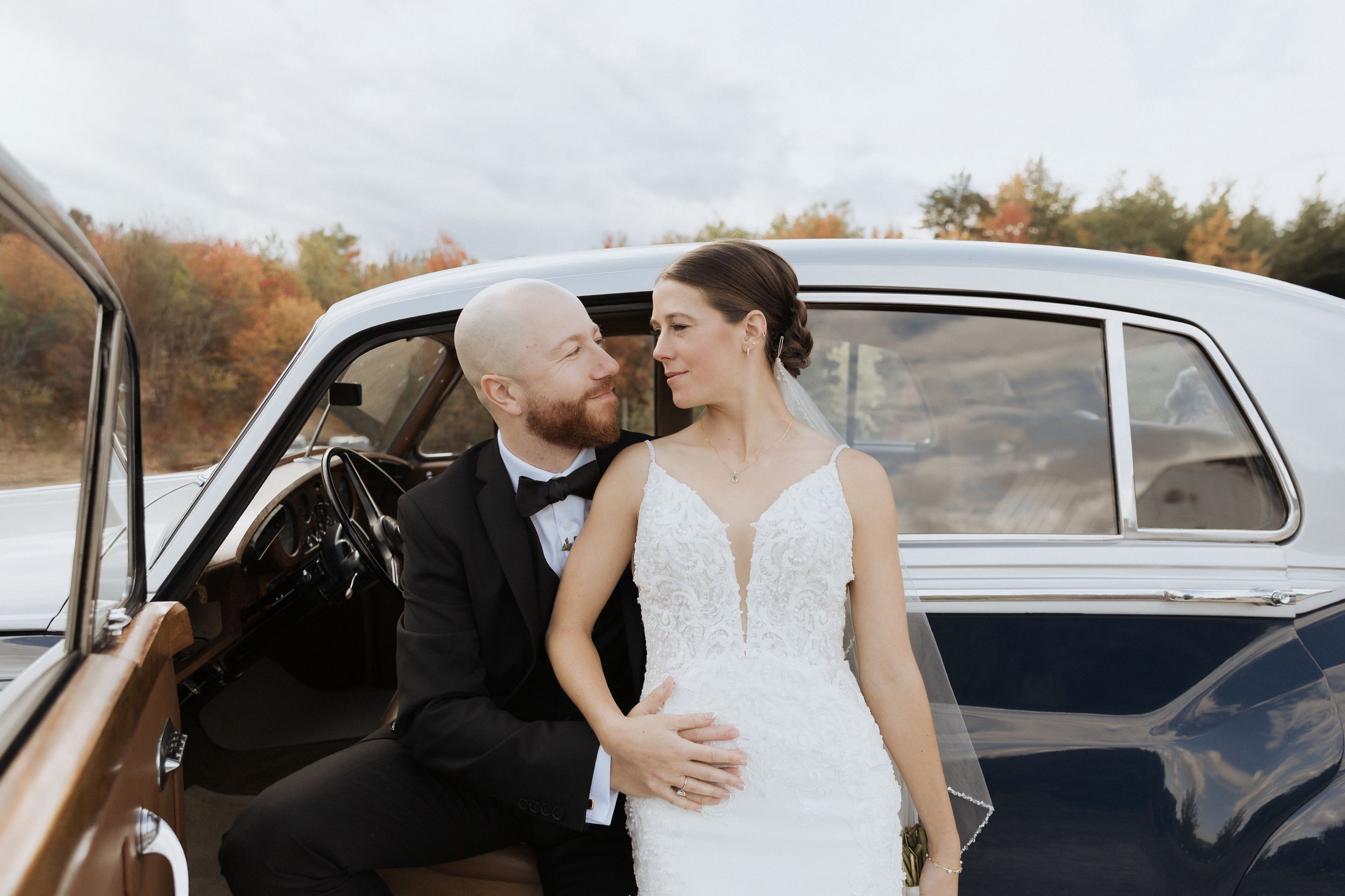 Bride and groom romantic wedding portraits with antique classic car at Farmer Brown's Greenhouse, New Brunswick wedding photographer