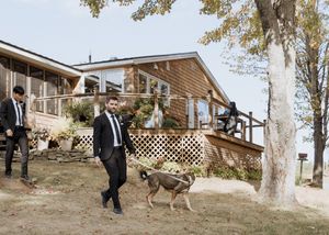 Outdoor fall wedding at Farmer Brown's Greenhouse, Moncton wedding photography, New Brunswick, groomsman walks dog down the aisle