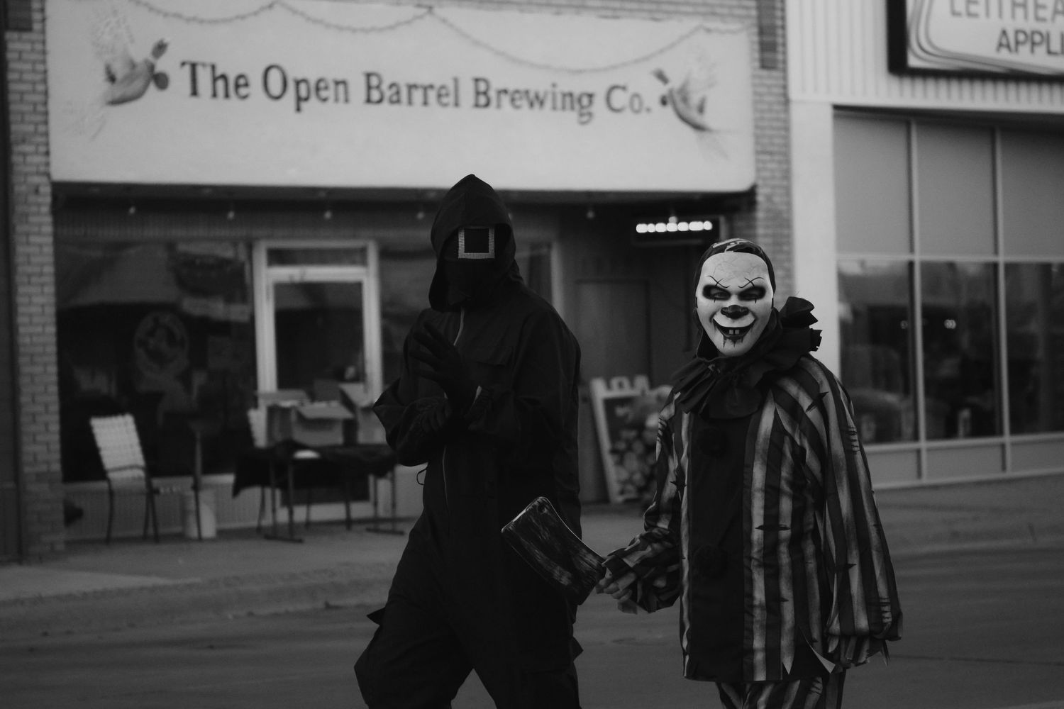 The Open Barrel Brewing Co. storefront sign is visible on a brick building exterior.