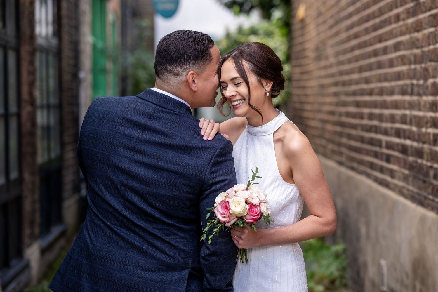 Couple in London street in Islington enjoying a fun moment